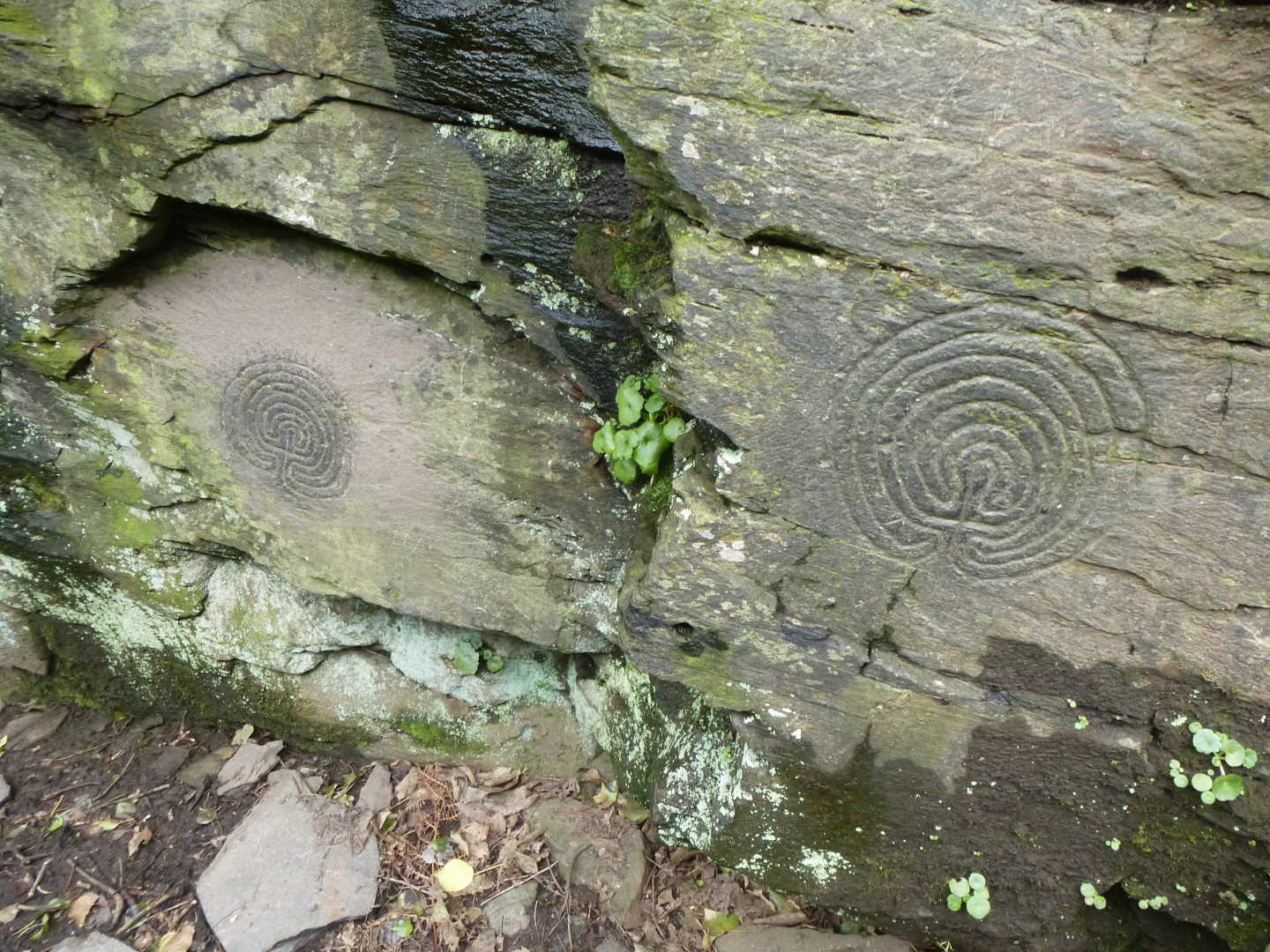 A photo of a circular rock carving